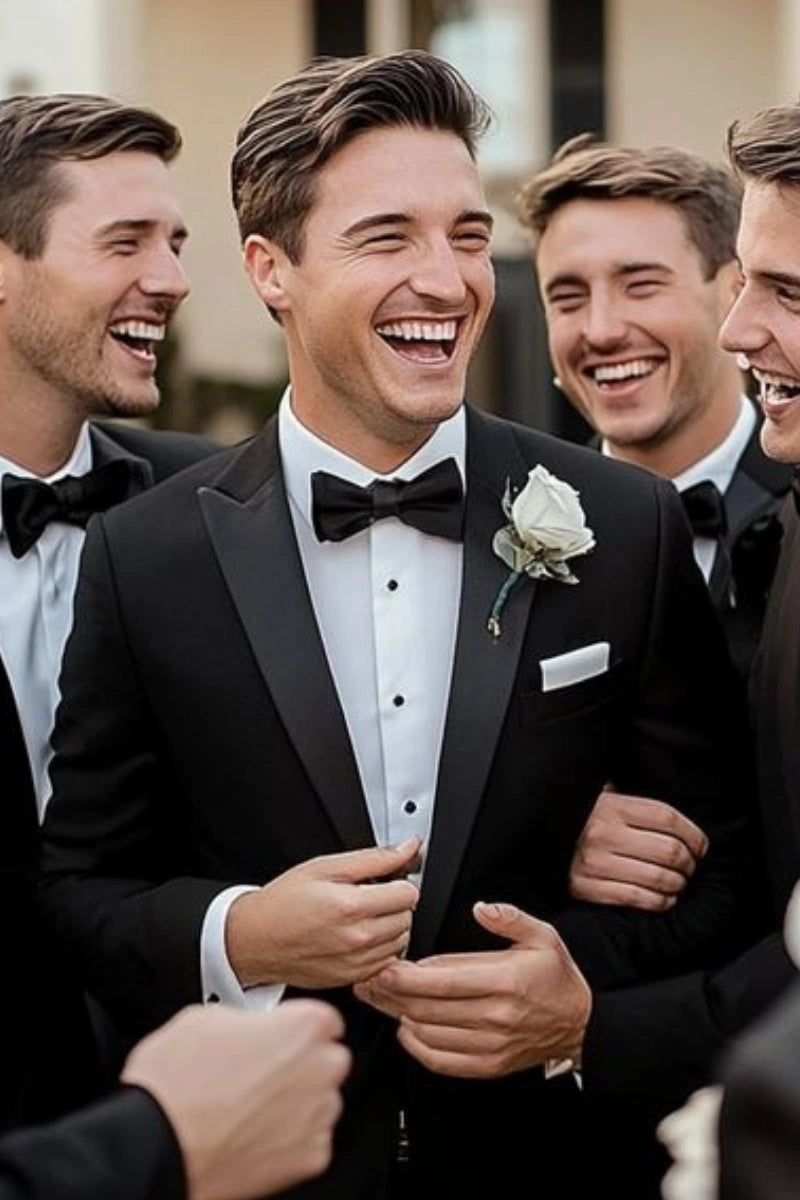 Tailored black tuxedo with peak lapel