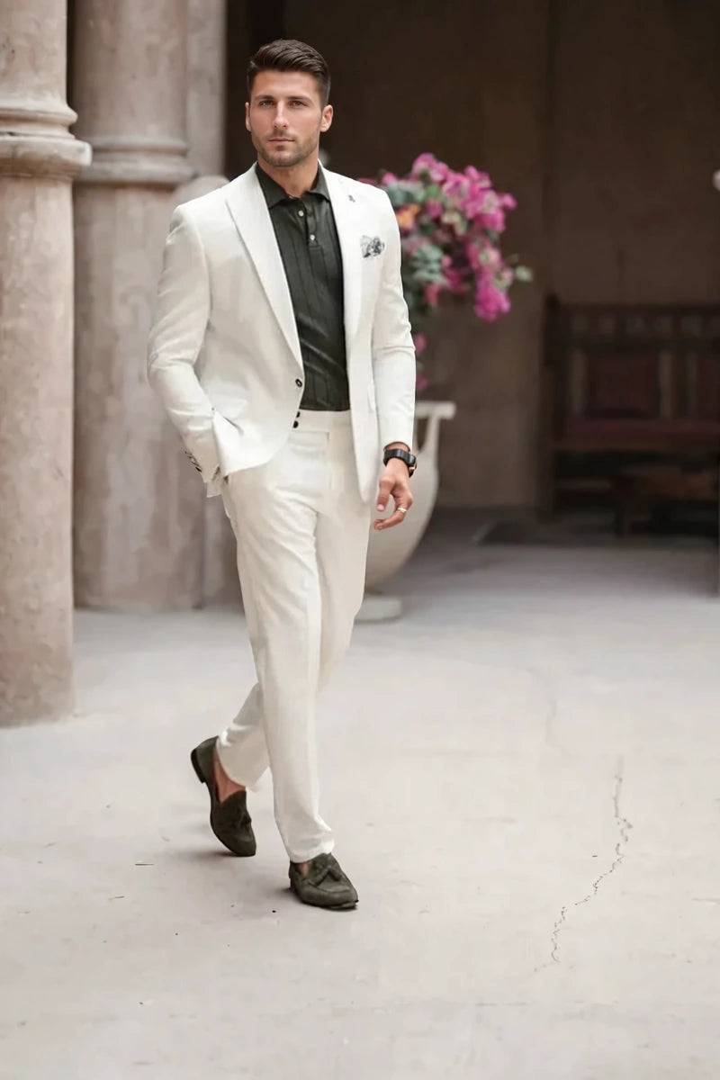 Groom wearing off-white two piece suit