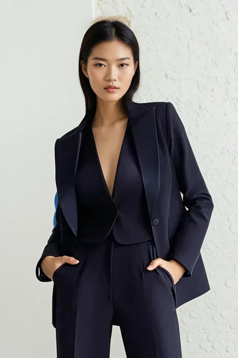 women black three-piece tuxedo suit showing tailored fit