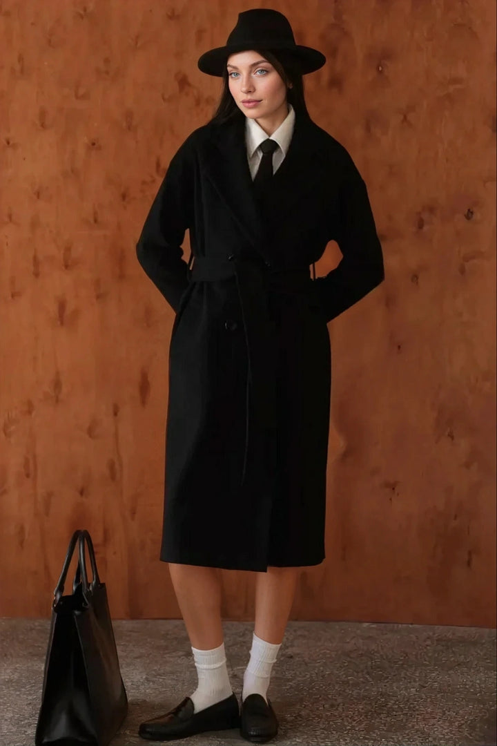 Women wearing vintage black wool overcoat for winter