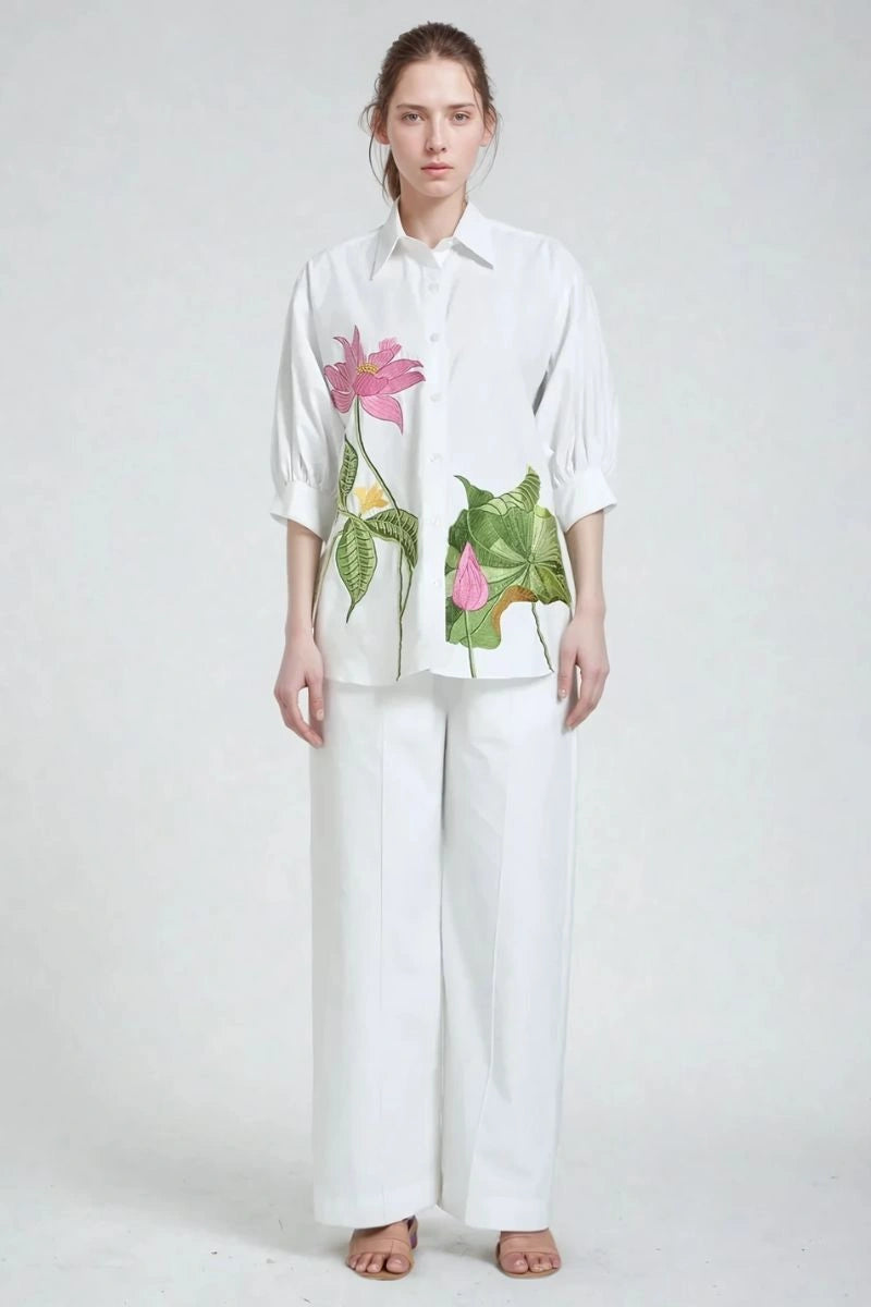 White designer women’s co-ord set with embroidered top and tailored trousers