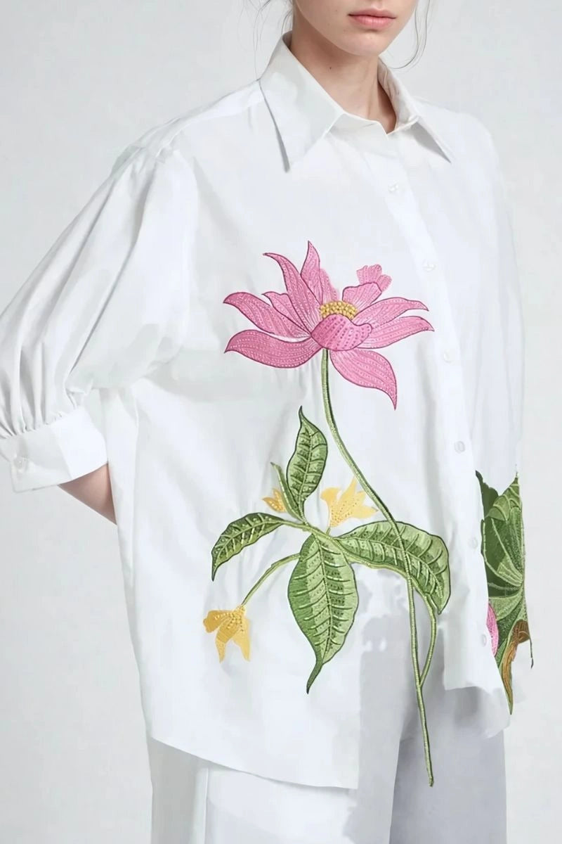 Stylish women’s puff sleeve top with front button closure and matching trousers