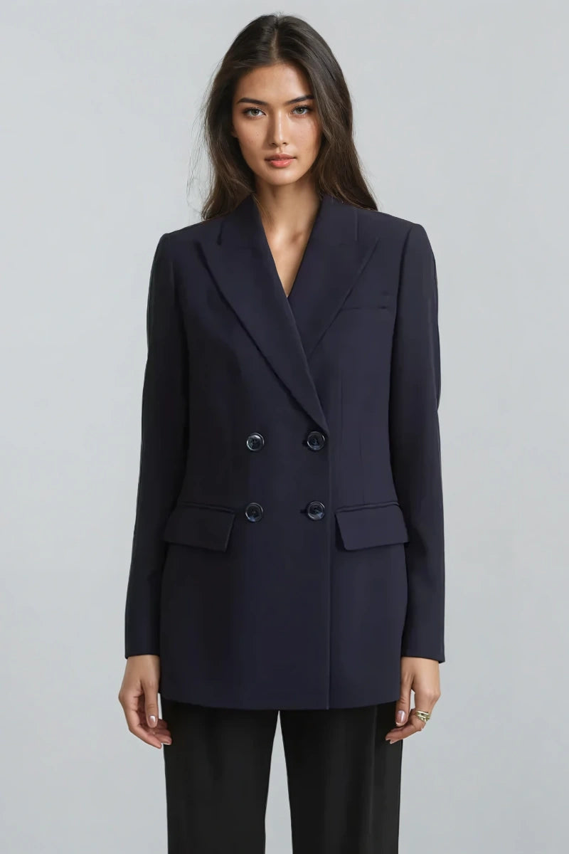 Women wearing double-breasted peak lapel blazer with four-button closure
