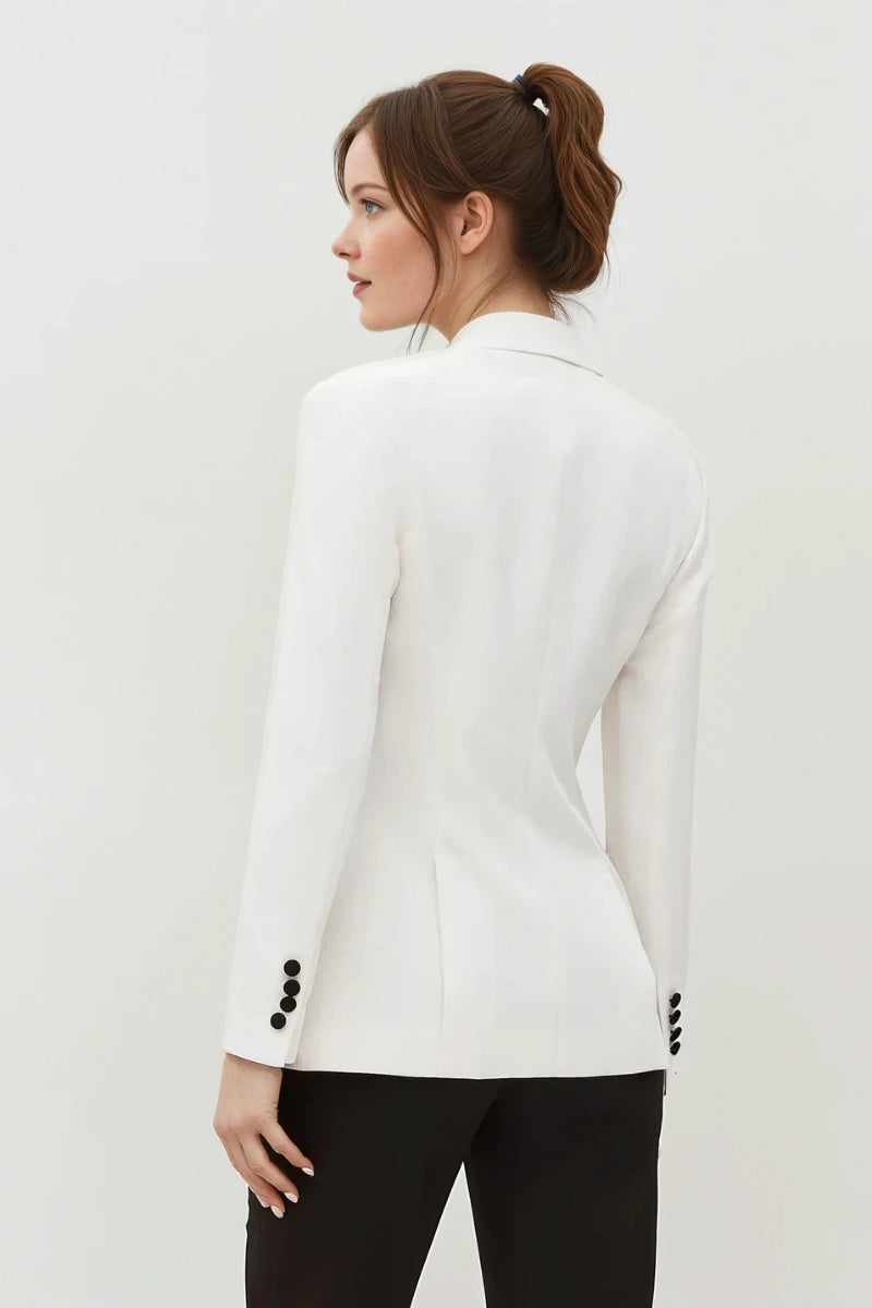 women white tuxedo blazer highlighting fitted silhouette