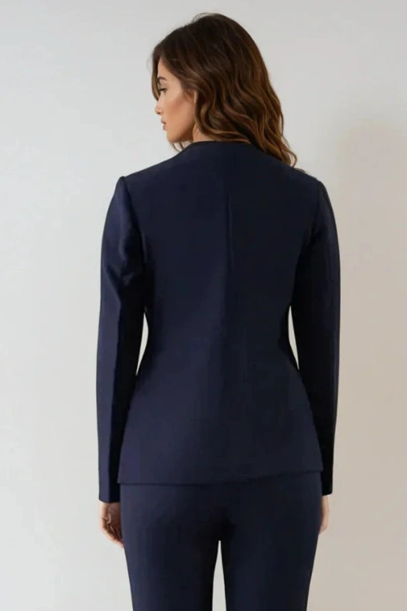 women blue blazer highlighting fitted silhouette