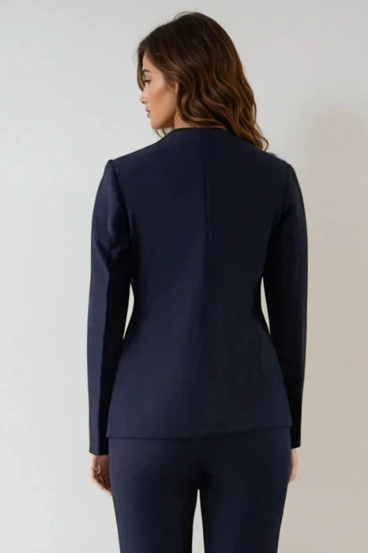 women blue blazer highlighting fitted silhouette